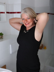 Hot German mature taking a shower