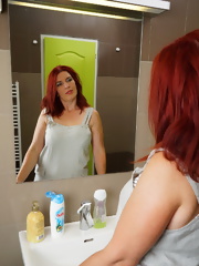 Sexy mature masturbating in her bathroom